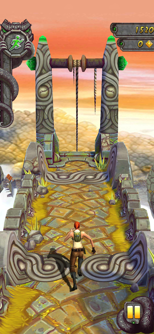 Temple Run 2 gameplay: runner sprinting along a jungle path while dodging obstacles